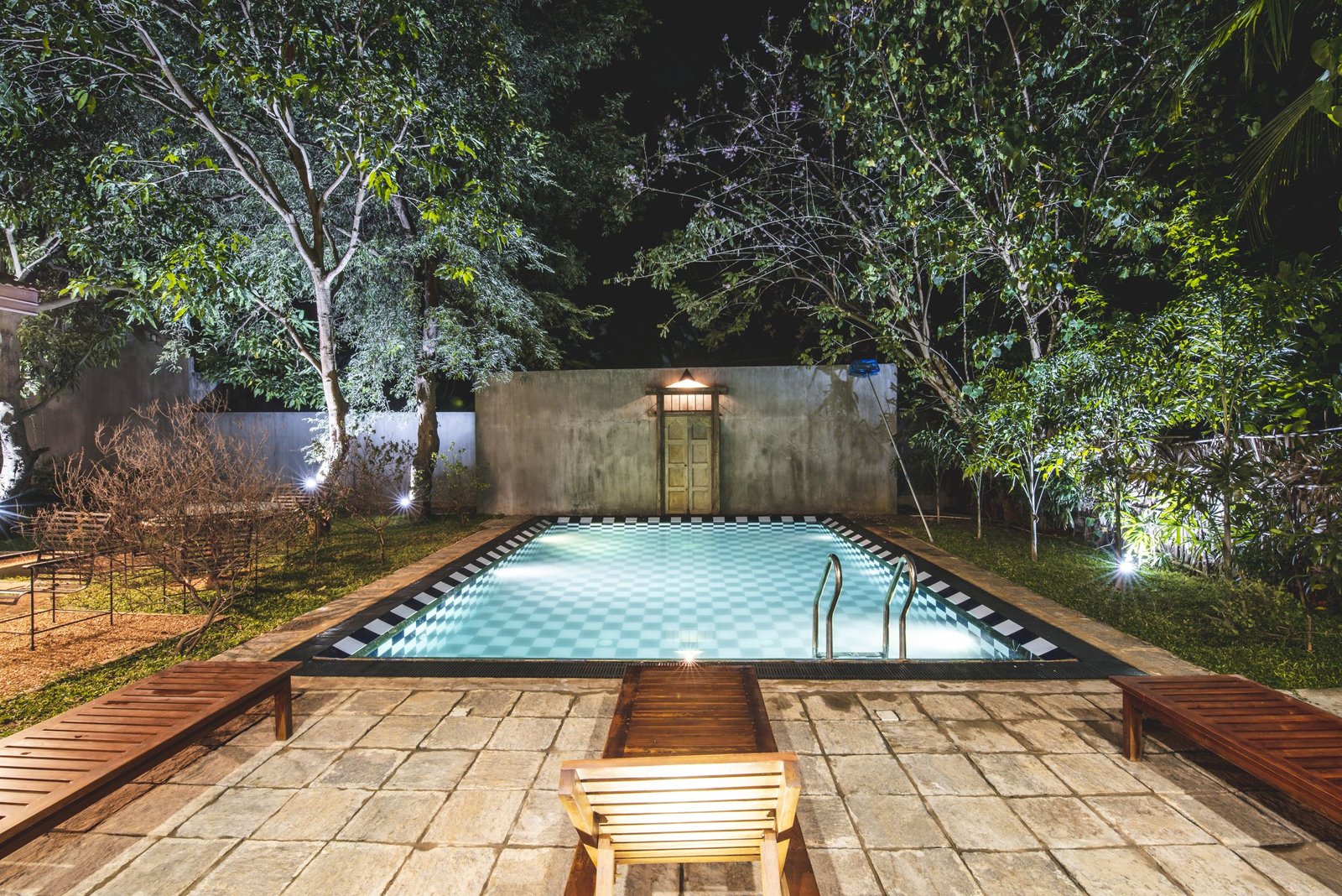 View of pool in the night at Thambu Illam, a luxury heritage villa in Jaffna